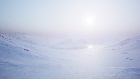 Aerial-Landscape-of-snowy-mountains-and-icy-shores-in-Antarctica