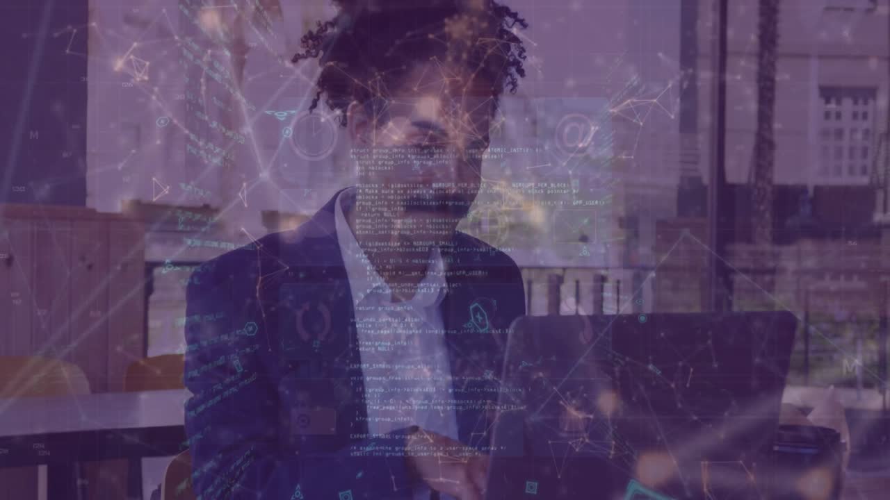 Animation of network of connections over caucasian businessman using laptop at a cafe