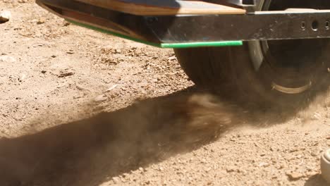 One-Wheel-Spinning-Dirt-Close-Up