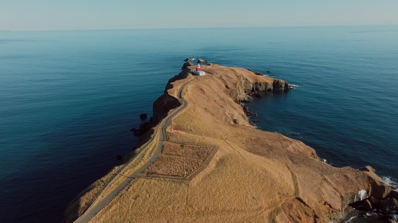 Tobutsumisaki Lighthouse Over Kiritappu Cape In Hamanaka, Hokkaido, Japan. Aerial Drone Shot