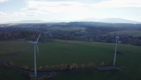 Wind-turbines-during-blue-hour-on-meadow