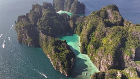 Spectacular Koh Phi Phi Lee Island in Thailand. Aerial of lagoon and Maya Beach surrounded by cliffs.