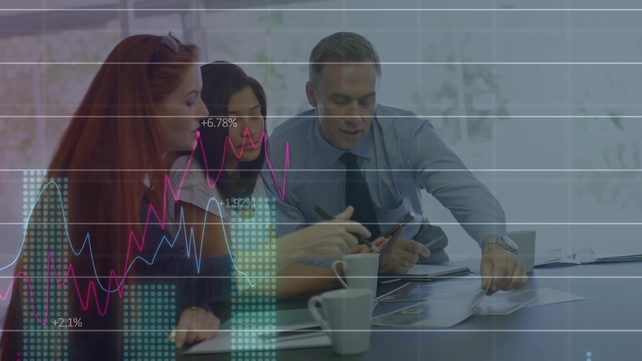 Animation of statistical data processing against diverse colleagues discussing together at office