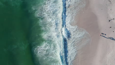 Tourist-Strolling-On-Sandy-Seashore-Of-Blouberg-Beach-In-Cape-Town,-South-Africa