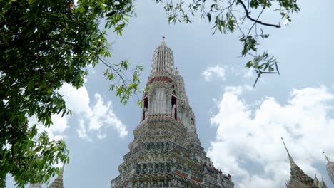 footage of the famous buddhist temple wat arun, also known as the temple of dawn, located on the chao phraya river in downtown bangkok, thailand