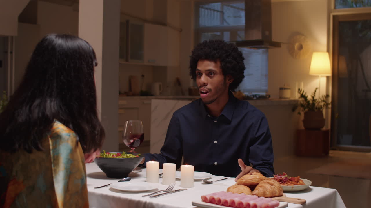 Female Brunette Surprising Her Boyfriend with Gift in Box at Valentines Day