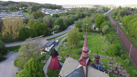 4K-Aerial-Footage-Overhead-Looking-Down-at-Church-in-Lerum,-Town-in-Vastra-Gotaland,-Sweden