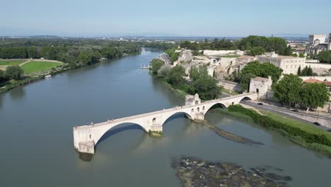 Landmark-damaged-bridge-Pont-Saint-Benezet-Avignon-France-aerial-drone-4K-footage