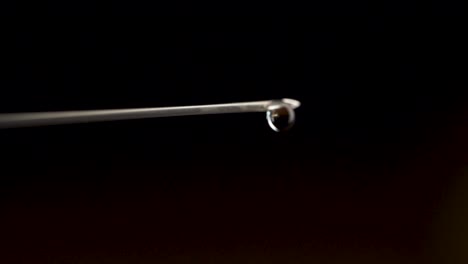 syringe needle with droplet