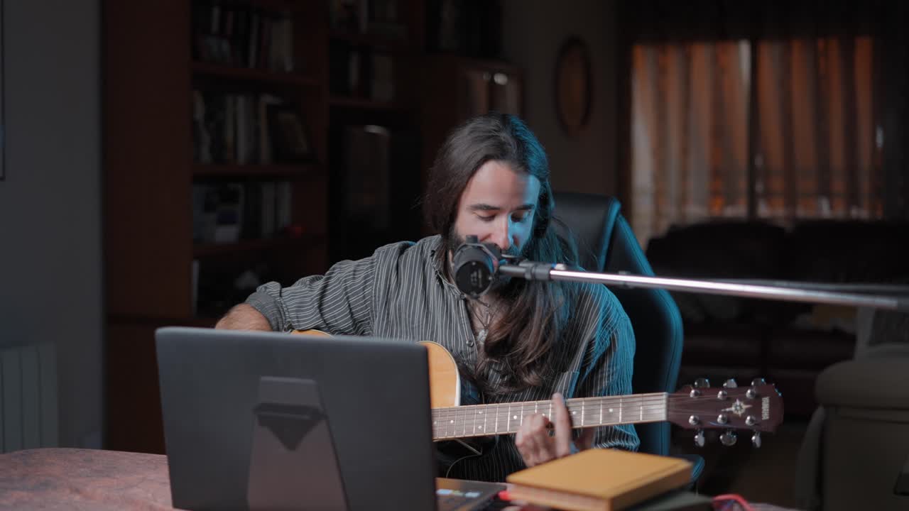 Man playing guitar and singing live stream session