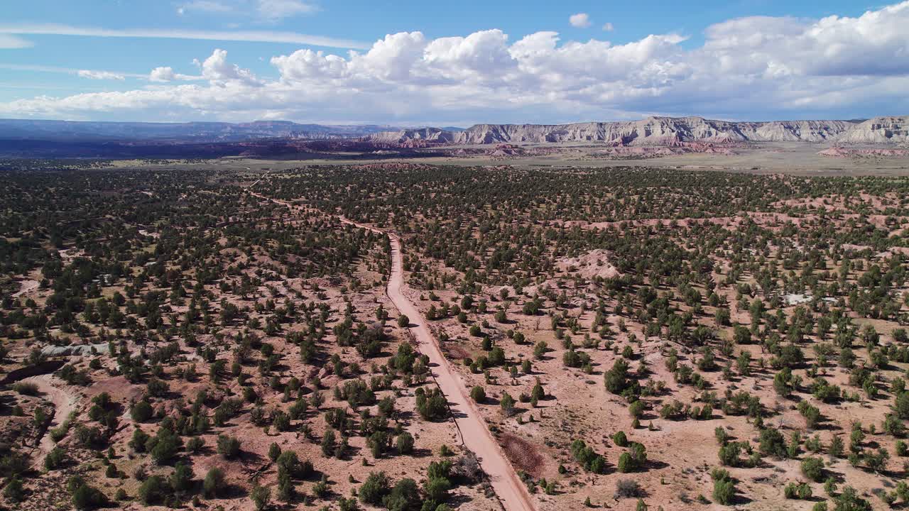 Areal shot of following a road in Cottonwood Canyon, Utah, USA