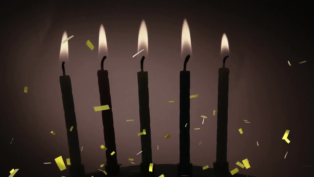 animación de confeti de oro cayendo sobre velas de pastel de cumpleaños encendidas