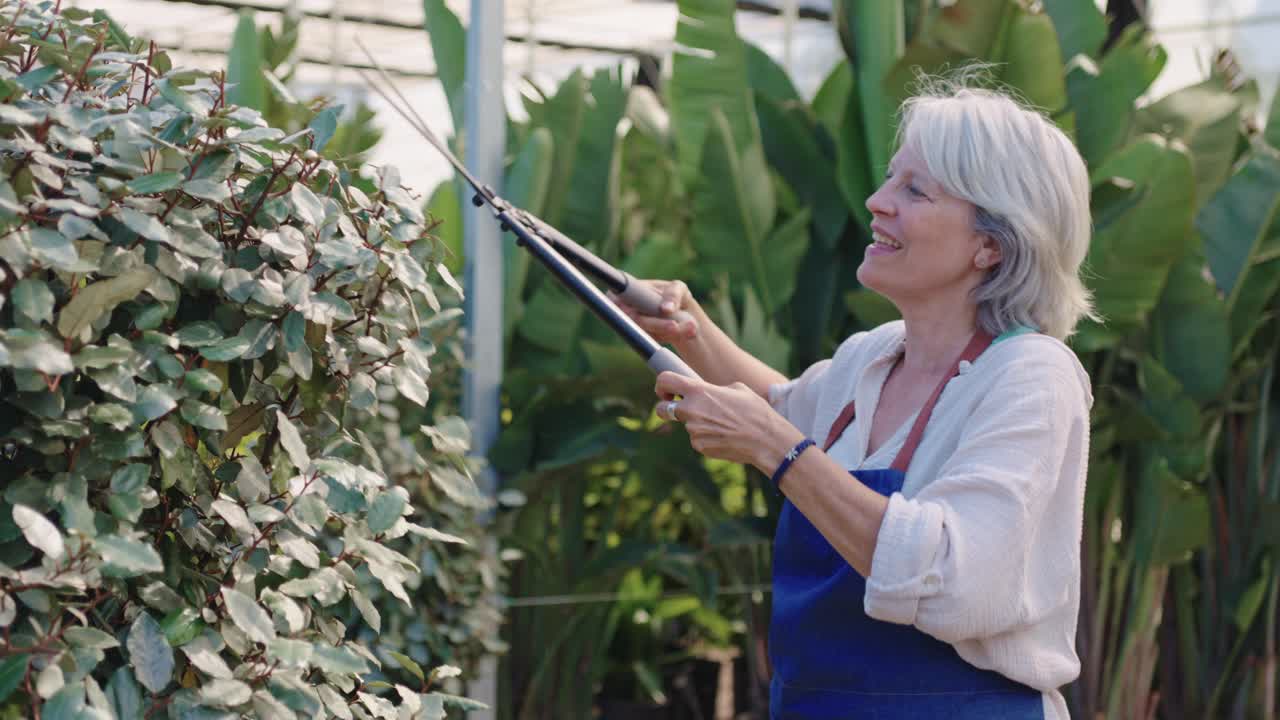 Woman Gardening in Greenhouse