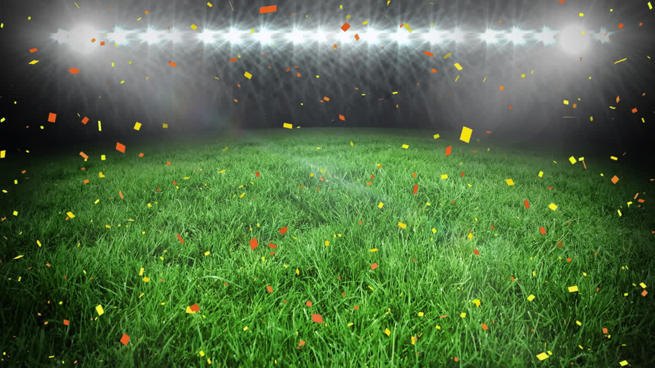 밤에 스포츠 경기장 위에 떠다니는 콘페티의 애니메이션