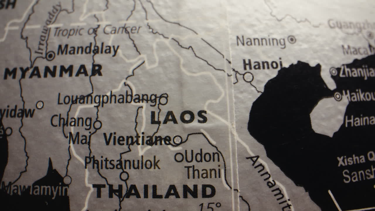 Close-up of a globe showing Southeast Asian countries like Laos and Thailand