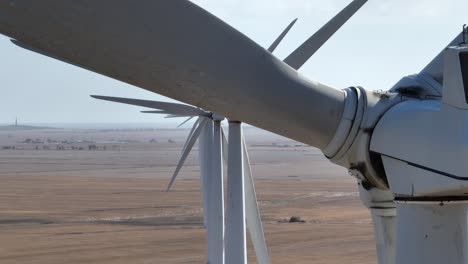 stationary shot of wind turbines shot on telephoto zoom lens