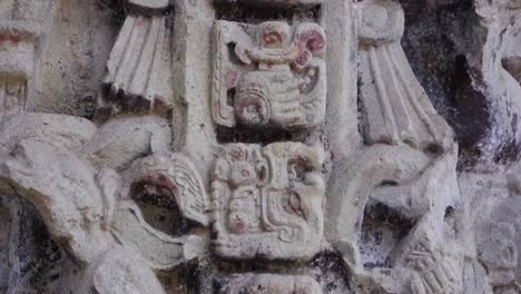 tilt down ornate carved stone stela at ancient mayan ruin of copan