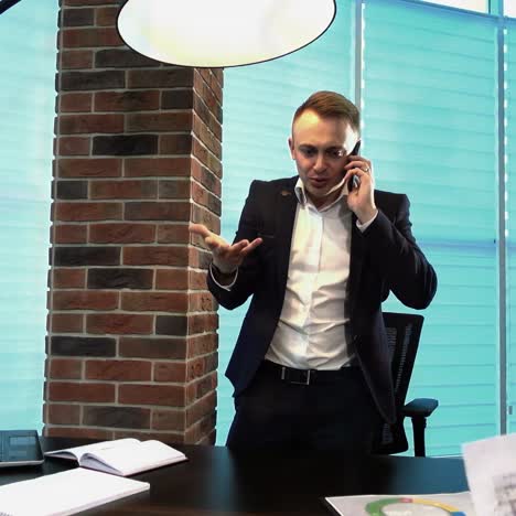 businessman throwing paper sheets in the air