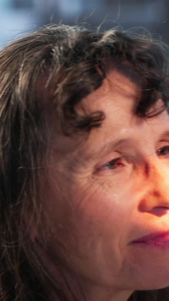 Vertical Video Male medic doing a neurological consultation with a pen light