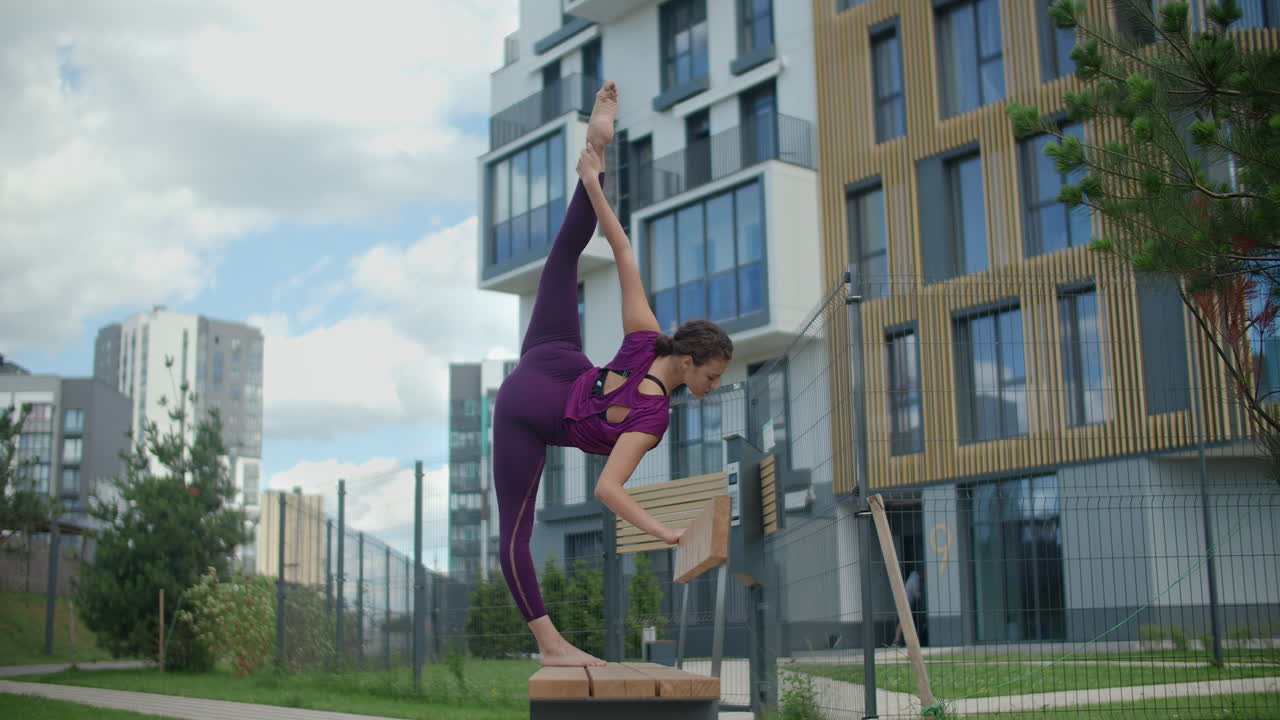 Woman Stretching in an Urban Park