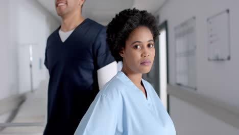 diverse healthcare professionals in a hospital corridor