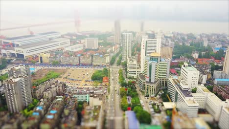 day time wuhan cityscape riverside industrial aerial panorama 4k tilt shift china