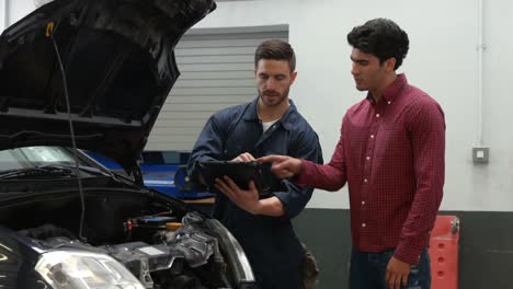 mechanics overhauling an engine