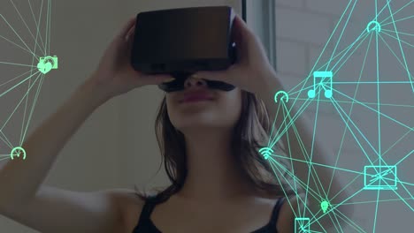 globe of network of connections against woman using vr headset