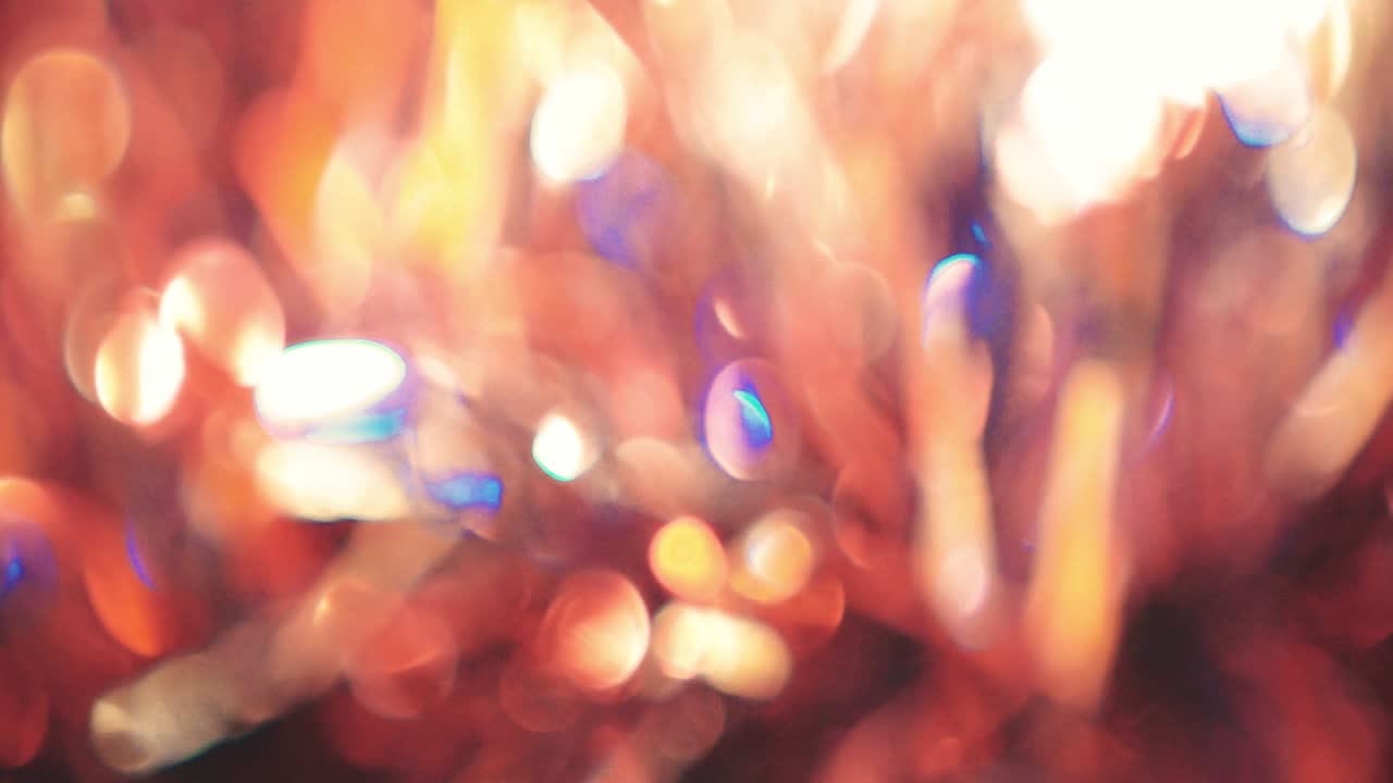 축제 장식: 빛나는 반점과 입자의 추상적인 배경