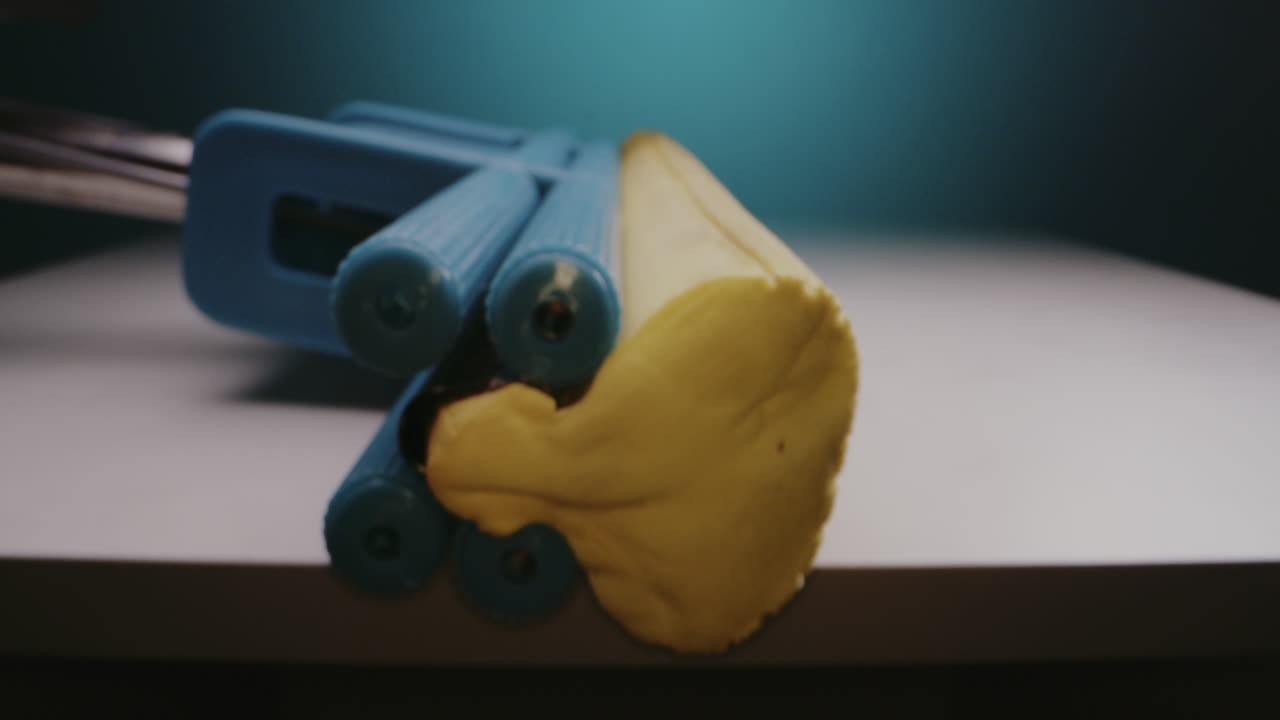 Close-up of a mop handle