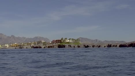 slow motion gimbaled footage of the shoreline near san carlos in the sea of cortez