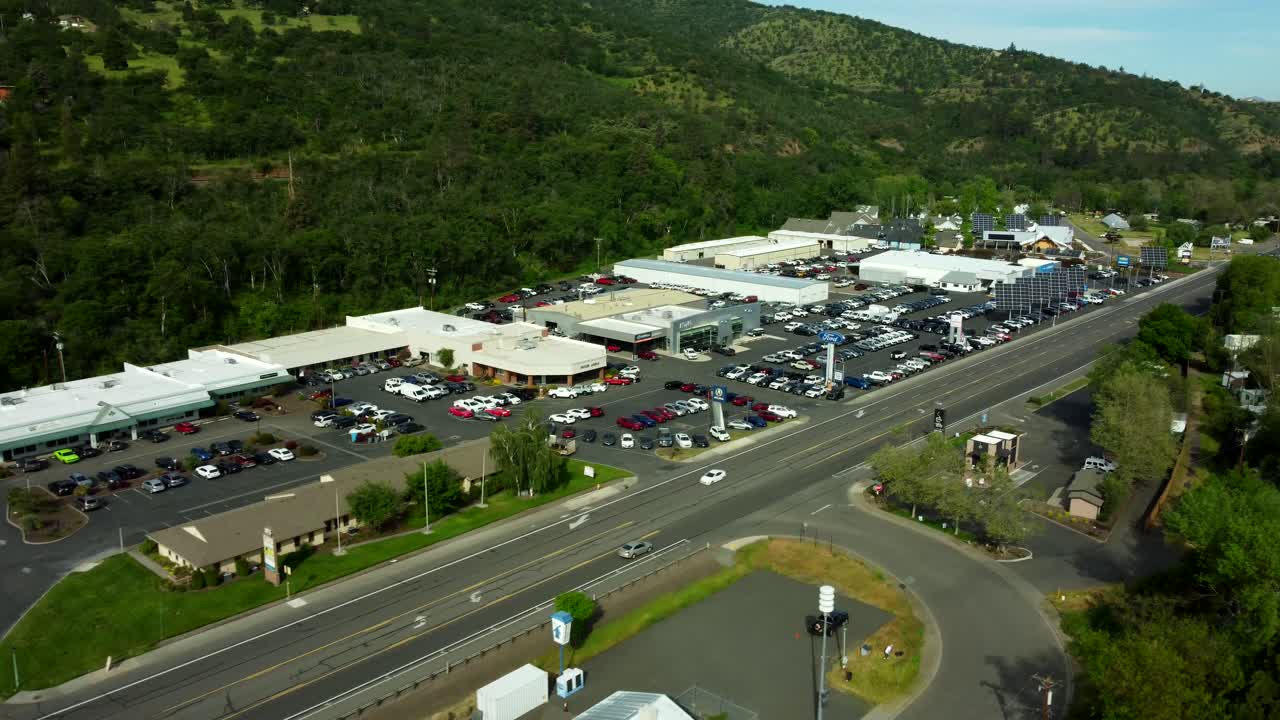USA, OR, Ashland, Car Dealerships, 2024-05-14 - Car dealerships along Hwy 99 in the North of Ashland. From left to right are Ashland Motor, Butler Acura, Butler Ford, and TC Chevrolet