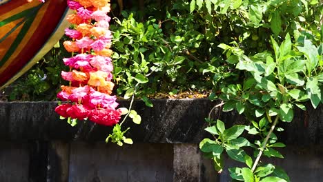 colorful thai boat and decorations by the canal
