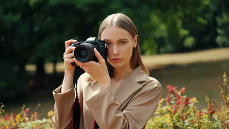 woman holding a camera