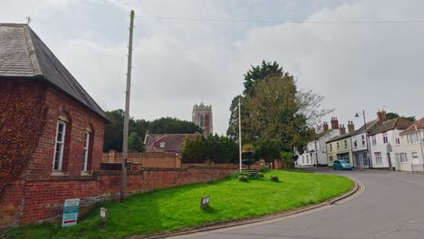 video clip of buildings and shops, with the parish church in the historical market town of burgh le marsh on the edge of the lincolnshire wolds