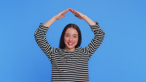 woman feeling in safe making roof above head with hands insurance security service playing game