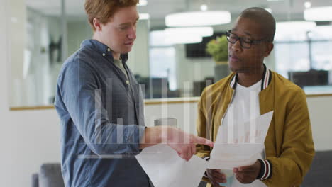 two men discussing documents with financial data processing animation over them