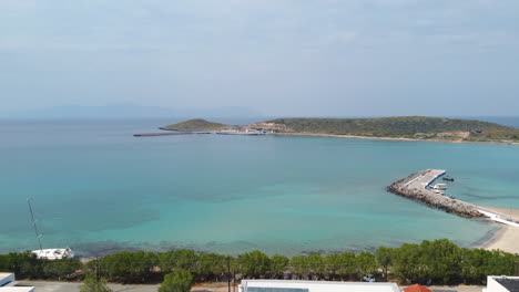 diakofti town and the surrounding area are seen from above on a scorching summer day in kythera island, greece, europ