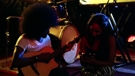 couple rehearsing music on concert 4k