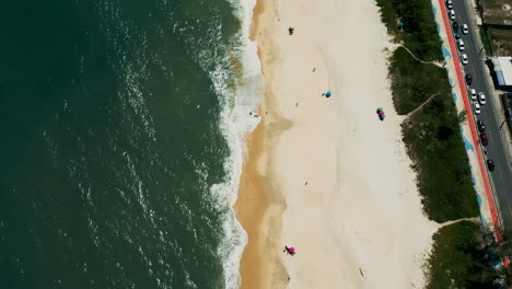 drone footage of jaconé beach, main street, division of maricá and saquarema boroughs, rio de janeiro, brazil