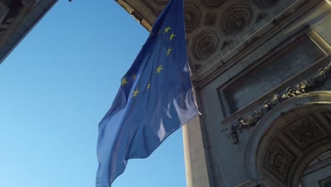eu flag waves under ceremonial arch. european union symbol