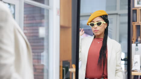 retail, shopping and sunglasses of a woman at shop