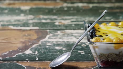 yogurt with blueberries and golden berries in bowl 4k