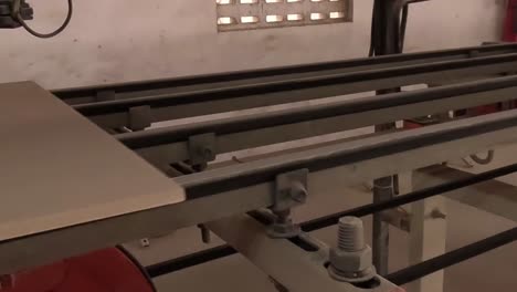 heated ceramic tiles moving the conveyor line, high quality 4k shot