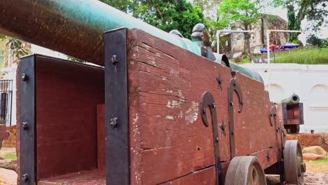 the old cannon at the ruins of porta de santiago in a famosa, malacca malaysia - closeup shot