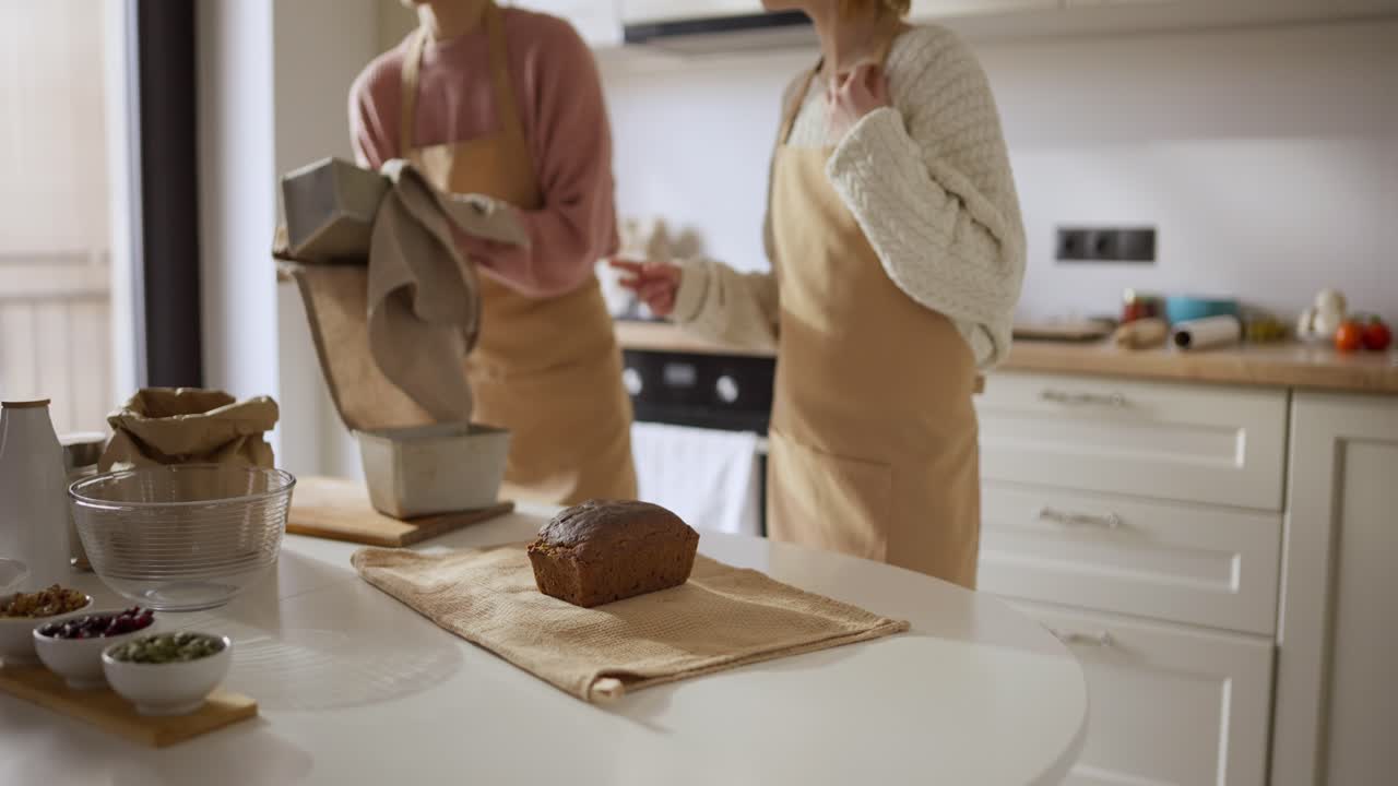 Family Baking Bread in Kitchen