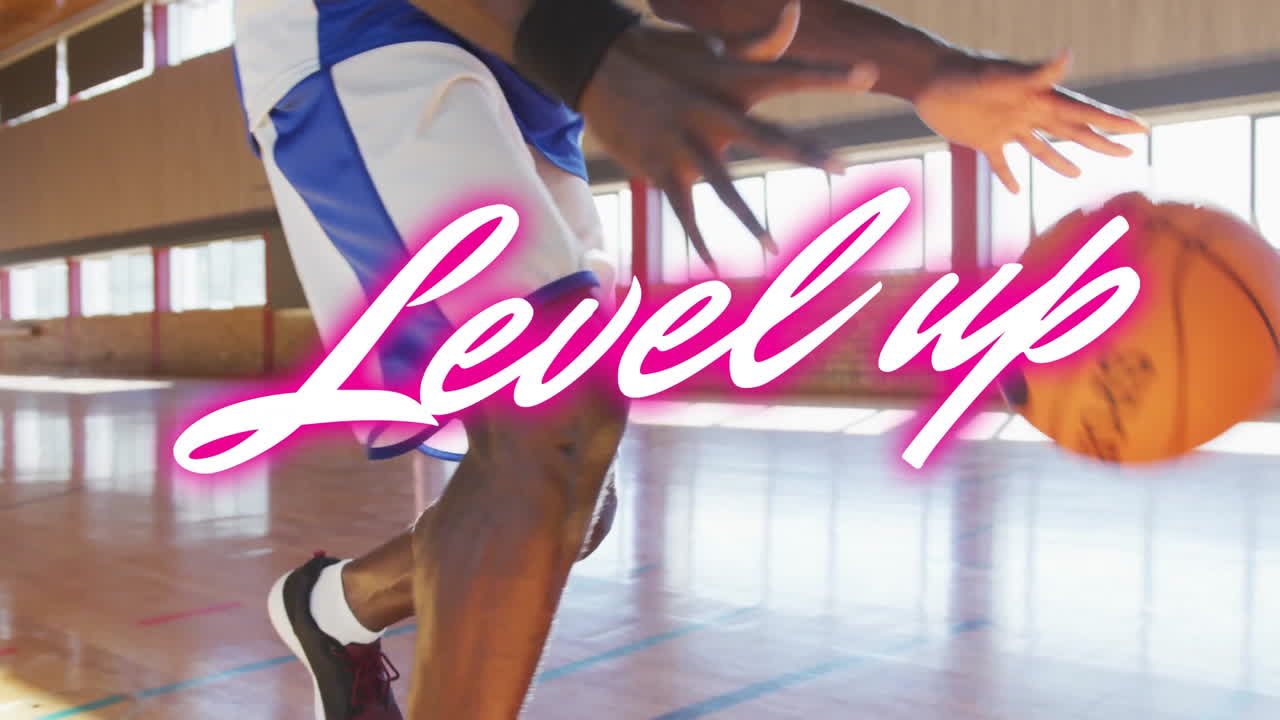 Dribbling basketball on court with animation text overlay Level Up