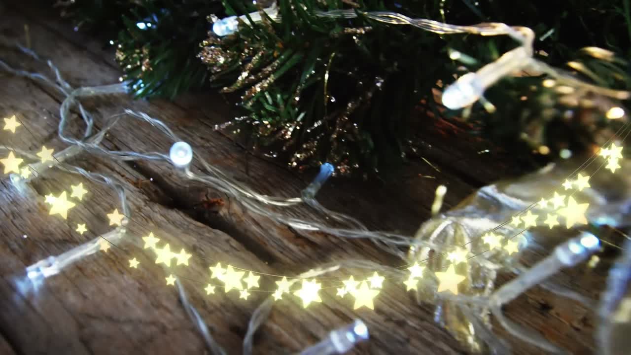 Animation of star string lights and bchristmas tree decorations