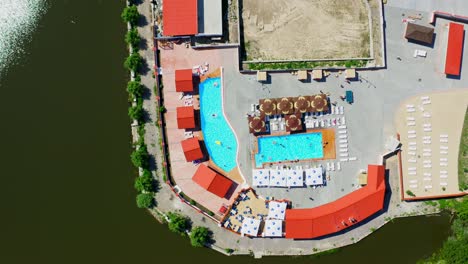aerial view of pool complex. aerial drone bird eye view of pool resort