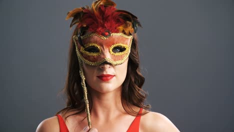 portrait of beautiful woman wearing masquerade mask 4k